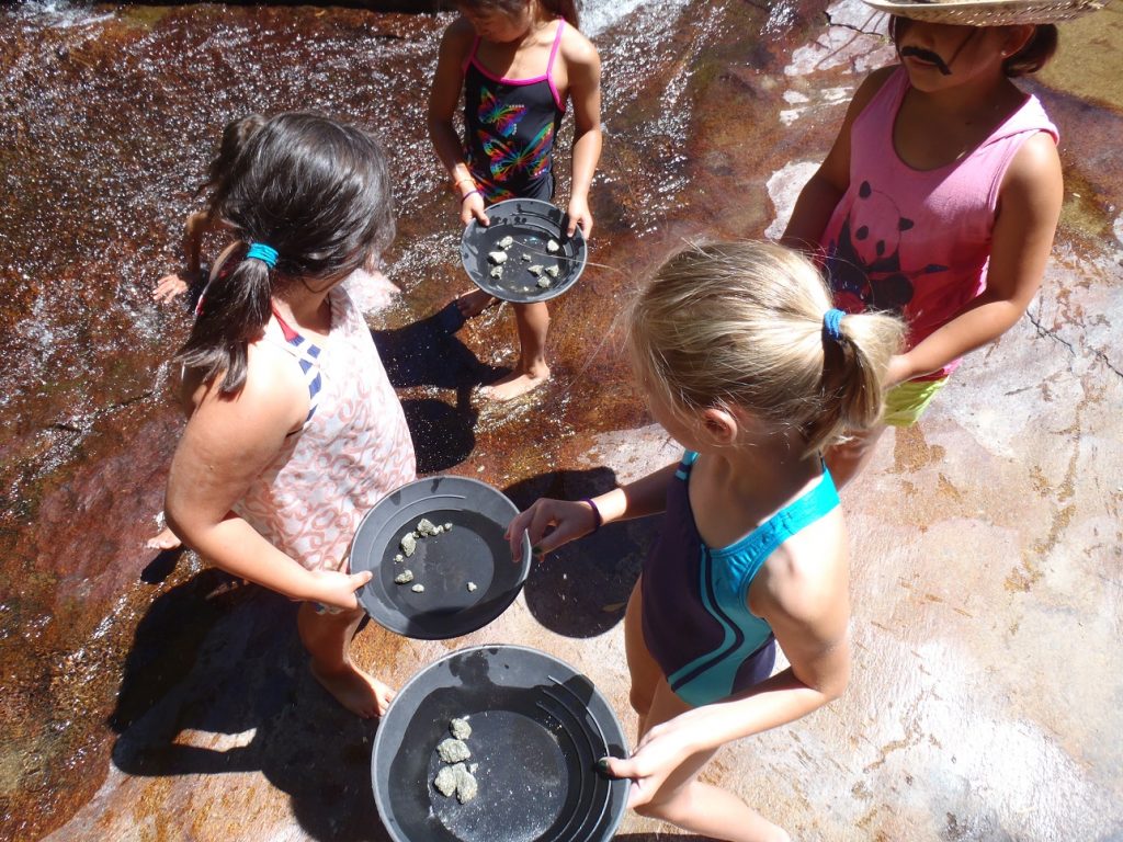 panning for gold in the creek