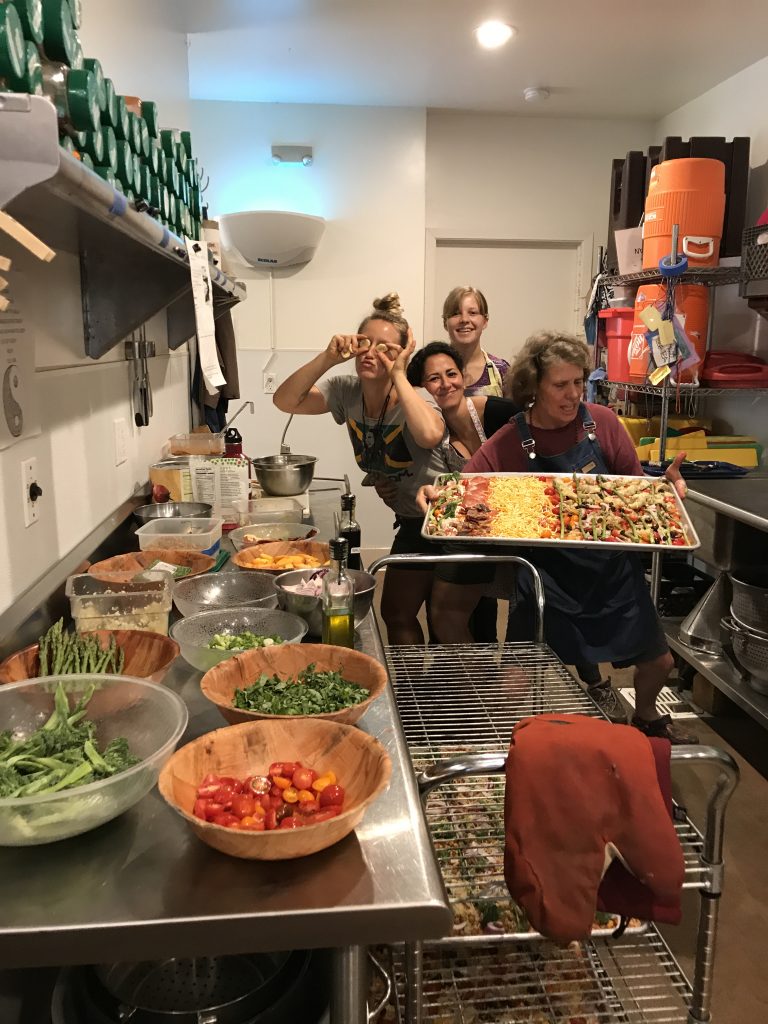 A group of women in a kitchen.